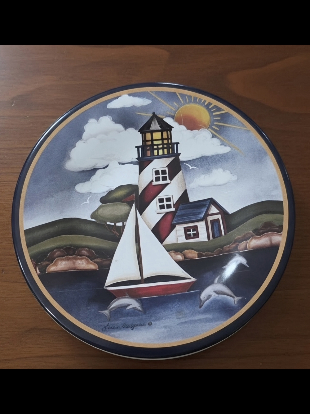 Vintage lighthouse candy tin 7x7